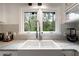 Close-up of kitchen sink and counter, highlighting the bright natural light at 3473 Regalwoods Dr, Atlanta, GA 30340