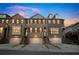 Charming multi-story townhomes with brick facades, private garages, and inviting staircases at 4121 Townsend Ln, Atlanta, GA 30346