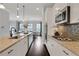 Bright, modern kitchen featuring stainless steel appliances, granite countertops, and ample cabinet space at 4121 Townsend Ln, Atlanta, GA 30346