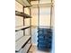 A walk-in closet with metal shelving and drawers for organization at 4121 Townsend Ln, Atlanta, GA 30346