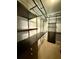 Walk-in closet with custom shelving, drawers, and ample storage space at 4121 Townsend Ln, Atlanta, GA 30346