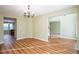 Bright dining area showcases wood floors and an open layout, perfect for entertaining and Gathering meals at 4033 Roxberry Hill Ln, Buford, GA 30518