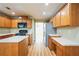 Well-equipped kitchen with ample cabinet space, modern appliances, and an island for food preparation at 4033 Roxberry Hill Ln, Buford, GA 30518