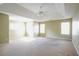 Spacious main bedroom features a neutral color palette, carpet, and ample natural light at 4033 Roxberry Hill Ln, Buford, GA 30518