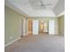 Unfurnished bedroom features multiple closets and doorways, and neutral carpet at 4033 Roxberry Hill Ln, Buford, GA 30518