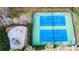 Overhead view of tennis courts and playground with bench seating surrounded by trees at 4033 Roxberry Hill Ln, Buford, GA 30518