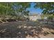Leafy backyard with mature trees, backing to the house at 4950 Luke Dr, Cumming, GA 30040