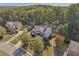 Charming two-story home nestled among mature trees, offering a serene and private setting at 4950 Luke Dr, Cumming, GA 30040