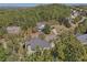 A picturesque suburban home sits amidst lush greenery, offering a peaceful and private setting at 4950 Luke Dr, Cumming, GA 30040