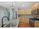 Kitchen featuring granite counters, stainless steel appliances, and ample cabinetry at 4950 Luke Dr, Cumming, GA 30040