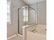A modern bathroom boasts a shower enclosure and a separate bathtub, enhancing relaxation and convenience at 2220 Golden Valley Dr, Lawrenceville, GA 30043