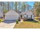 Charming single-story home with attached garage and well-maintained front yard at 2220 Golden Valley Dr, Lawrenceville, GA 30043