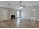 Bright living room with hardwood floors, fireplace, and fresh neutral paint at 2220 Golden Valley Dr, Lawrenceville, GA 30043