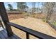 Spacious backyard showcasing a flat, grassy area perfect for outdoor activities at 1930 Collins Hill Rd, Lawrenceville, GA 30043
