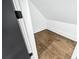 View of a storage area with wood flooring and a white interior at 1930 Collins Hill Rd, Lawrenceville, GA 30043