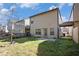 A townhouse backyard featuring a concrete patio, small yard and the home's rear facade at 3045 Hendrick Dr, Mcdonough, GA 30253