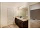 Bathroom featuring double sinks, granite countertops and a large mirror offering lots of space at 3045 Hendrick Dr, Mcdonough, GA 30253