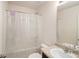 Bathroom featuring neutral colored walls, a vanity with solid surface countertop and a tub/shower combo at 3045 Hendrick Dr, Mcdonough, GA 30253