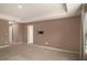 Spacious bedroom featuring modern carpeting and fresh paint at 3045 Hendrick Dr, Mcdonough, GA 30253
