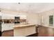 Modern kitchen with granite island, stainless steel appliances, and lots of cabinet space at 3045 Hendrick Dr, Mcdonough, GA 30253