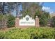 Green Valley community sign surrounded by lush landscaping and greenery at 3045 Hendrick Dr, Mcdonough, GA 30253