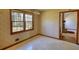 Bright breakfast nook with a view of the fireplace and door to other rooms at 380 Hidden Valley Sw Dr, Conyers, GA 30094