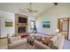 Charming living room featuring a brick fireplace, wood mantle, and neutral decor at 380 Hidden Valley Sw Dr, Conyers, GA 30094