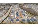 An aerial view of a well-planned residential community with tree-lined streets and ponds at 708 Chipping Sparrow St, Canton, GA 30115