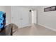 Neutral bedroom with double closet doors and a stylish framed art piece at 708 Chipping Sparrow St, Canton, GA 30115