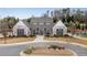 Beautiful clubhouse with brick accents, large windows, and landscaped surroundings at 708 Chipping Sparrow St, Canton, GA 30115