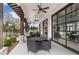 Inviting outdoor seating area with stylish furniture and views of the surrounding greenery at 708 Chipping Sparrow St, Canton, GA 30115