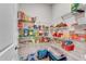 Walk-in pantry with plenty of shelves and organized storage for food and household items at 708 Chipping Sparrow St, Canton, GA 30115