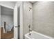 This bathroom features a tiled shower and tub, and luxury fixtures at 104 Briargate Dr, Johns Creek, GA 30097