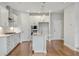 Well-appointed kitchen with stainless steel appliances, quartz countertops, and center island at 104 Briargate Dr, Johns Creek, GA 30097