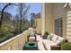 Cozy balcony with comfortable seating, perfect for relaxation and enjoying the surrounding scenery at 1363 Sheffield Glen Way, Atlanta, GA 30329
