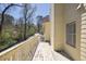 Exterior view of a spacious outdoor balcony with views of the nearby neighborhood at 1363 Sheffield Glen Way, Atlanta, GA 30329