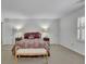 Bright and inviting bedroom with neutral carpeting, large windows and ample natural light at 1363 Sheffield Glen Way, Atlanta, GA 30329