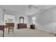 Bright bedroom featuring an adjacent bathroom and a large window with natural light at 1363 Sheffield Glen Way, Atlanta, GA 30329