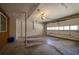 Spacious garage with concrete flooring, white walls and a manual garage door at 1363 Sheffield Glen Way, Atlanta, GA 30329