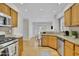 Updated kitchen with stainless steel appliances, granite counters, and a bright breakfast area at 1363 Sheffield Glen Way, Atlanta, GA 30329