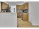 Spacious kitchen featuring stainless steel appliances, granite countertops, and light-colored cabinets at 1363 Sheffield Glen Way, Atlanta, GA 30329