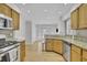 Updated kitchen with stainless steel appliances, granite counters, and a bright breakfast area at 1363 Sheffield Glen Way, Atlanta, GA 30329