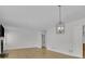 Open-concept living room features recessed lighting, a fireplace, and hardwood floors at 1363 Sheffield Glen Way, Atlanta, GA 30329