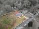Aerial view of property with boundary lines and surrounding neighborhood with mature trees and well-maintained streets at 1752 Atherton Dr, Decatur, GA 30035