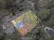 Property aerial view displaying the home's layout, tree coverage, and neighborhood location at 1752 Atherton Dr, Decatur, GA 30035