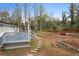 The backyard has a new deck and stone landscaping features, offering a perfect blend of relaxation and functionality at 1752 Atherton Dr, Decatur, GA 30035