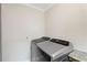 Laundry room with stainless steel washer and dryer at 1752 Atherton Dr, Decatur, GA 30035
