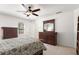 Large bedroom with ample storage, neutral walls, and ceiling fan at 2731 Old Coach Rd, Duluth, GA 30096