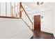 Foyer featuring hardwood floors, a staircase and an inviting entrance at 2731 Old Coach Rd, Duluth, GA 30096