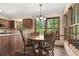 Kitchen featuring wood cabinets, stainless steel appliances, and granite countertops at 2731 Old Coach Rd, Duluth, GA 30096
